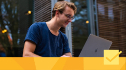 A man learning about the benefits of open access on a laptop
