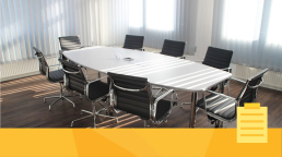 A room prepared for an editorial board meeting.