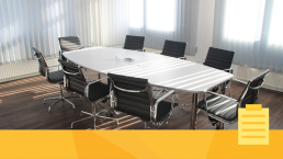 A room prepared for an editorial board meeting.