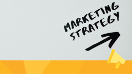 Marketing strategy written on a whiteboard.