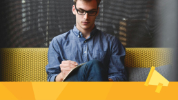 A man holding a pen and making editorial decisions to build journal reputation.