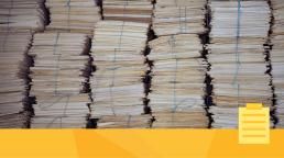 Stacks of paper representing article submissions.