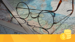 A pair of glasses on a map showcasing geographic diversity.